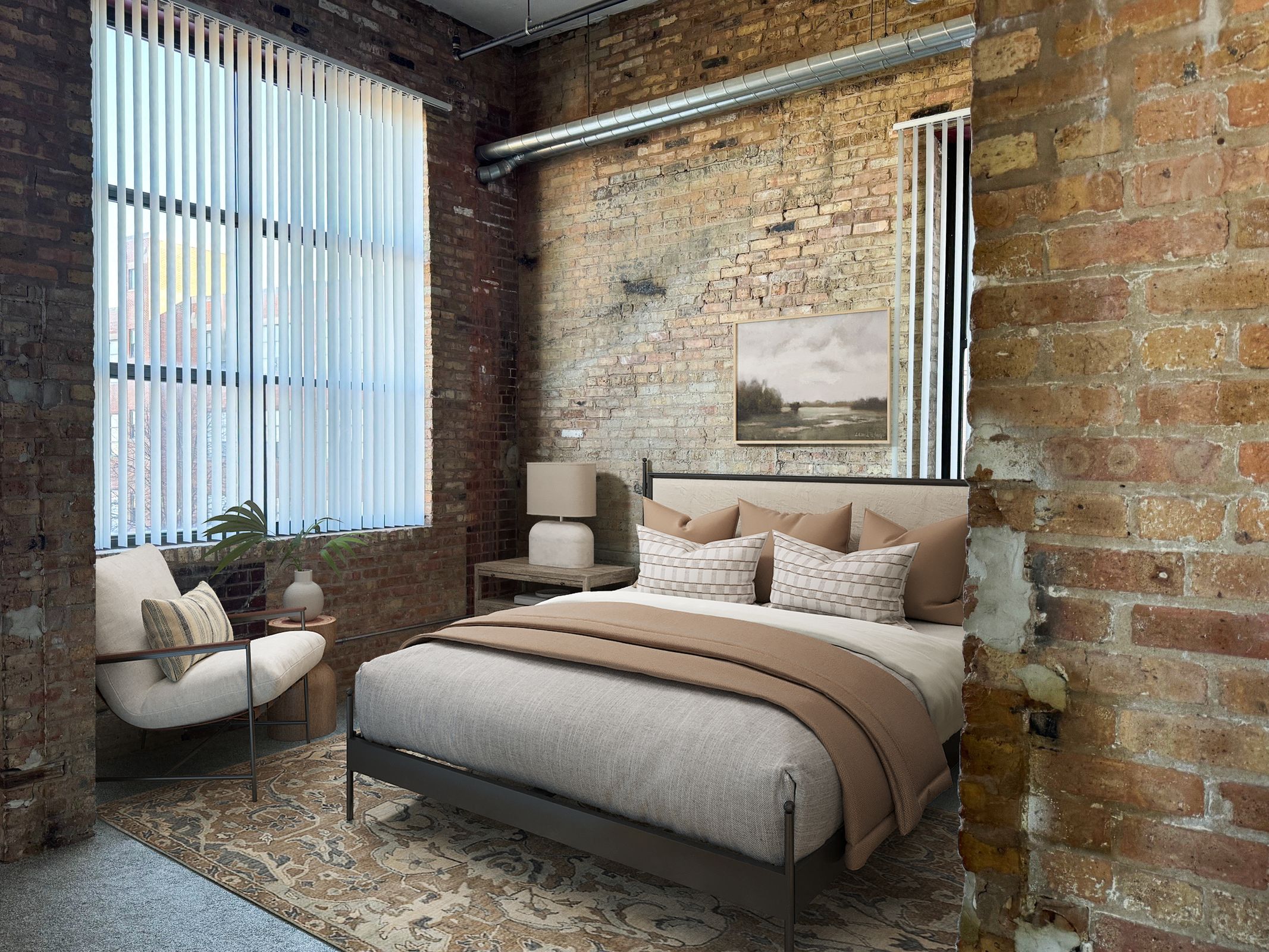 A bedroom with a brick wall and a bed with a brown headboard.